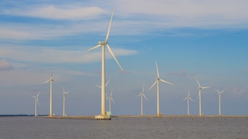 The photo depicts Wind energy.